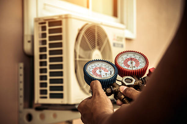 Professional Air Conditioning Service technician working in Kingston, NJ